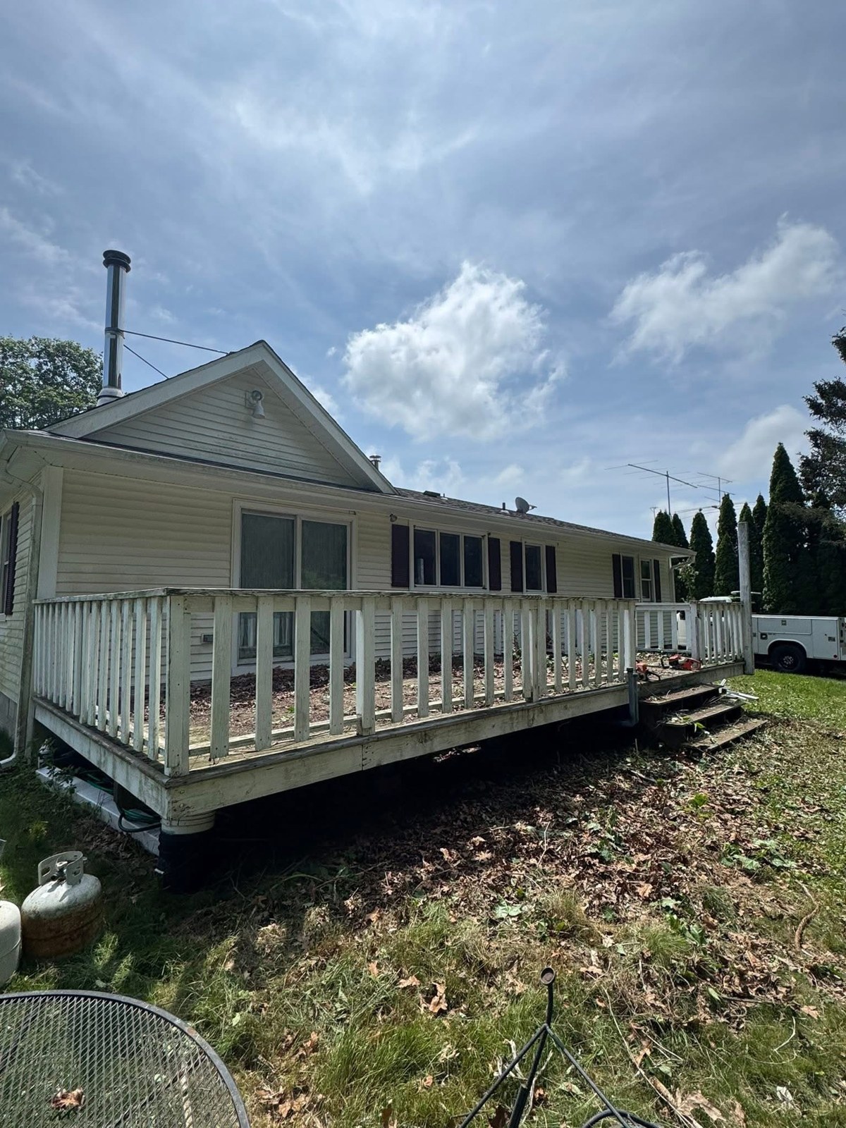 Deck area after overgrown shrubs were removed